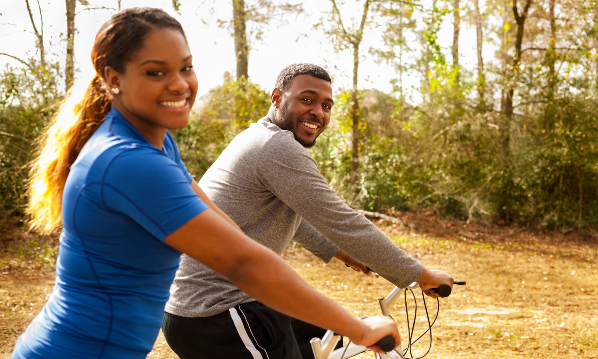 Two residents biking near The Retreat at Sherwood in Sherwood, Arkansas