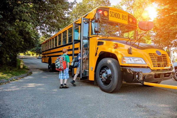 Children boarding their school bus near Stanford Pointe in Panama City,Florida