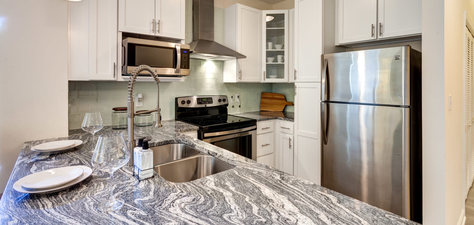 Kitchen with stainless-steel appliances at East Beach Marina, Norfolk, Virginia