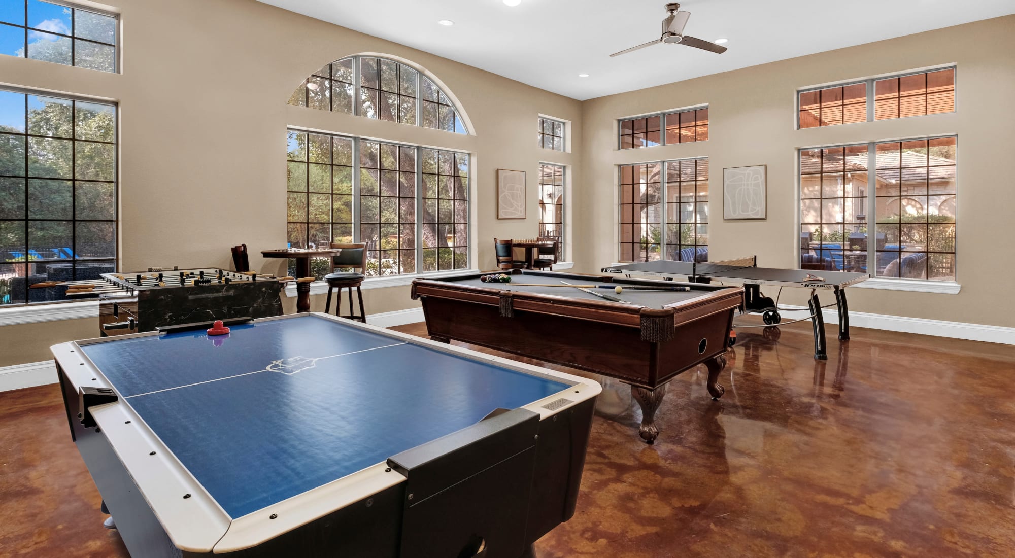 Resident clubhouse with a game room at Villas of Vista Del Norte in San Antonio, Texas