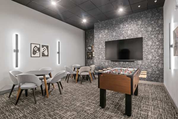 Community seating with ambient lighting at The Edmond in Rochester, New York