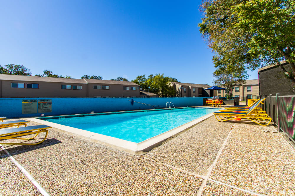 Resort style swimming pool at Sundance Apartments in College Station, Texas