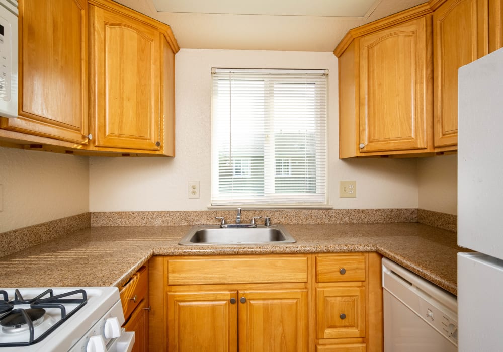 Kitchen with ample counter space at Alderwood Park Apartments in Livermore, California