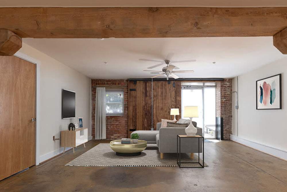 Well-lit apartment living area at High Street Lofts in Petersburg, Virginia