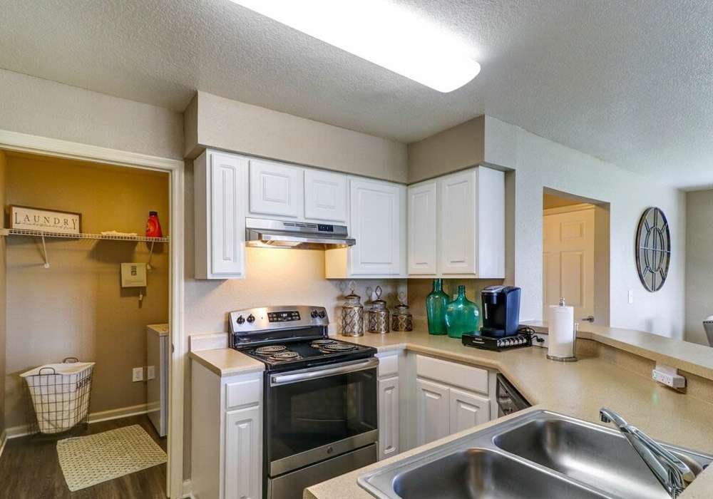 Fully furnished kitchen with stainless steel appliances at The Reserve at Kanapaha in Gainesville, Florida