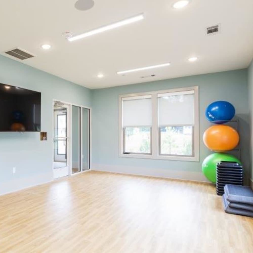 Fitness equipment in the yoga and pilates room at Retreat at Fairhope Village in Fairhope, Alabama