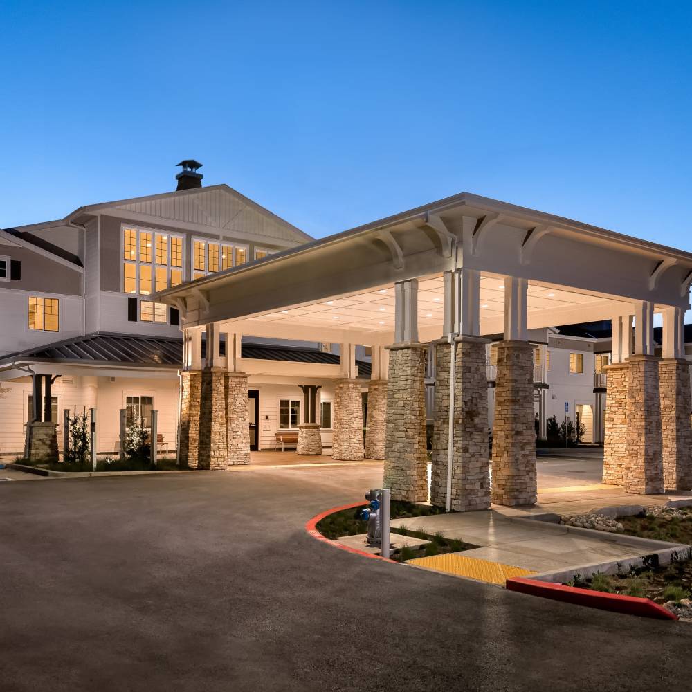 Exterior view with palm trees at Clearwater at Sonoma Hills in Rohnert Park, California