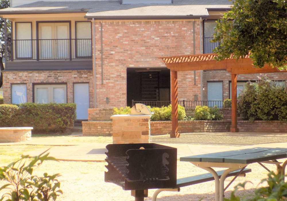 Poolside cabana and sundeck at Branch Creek Apartments in Carrollton, Texas