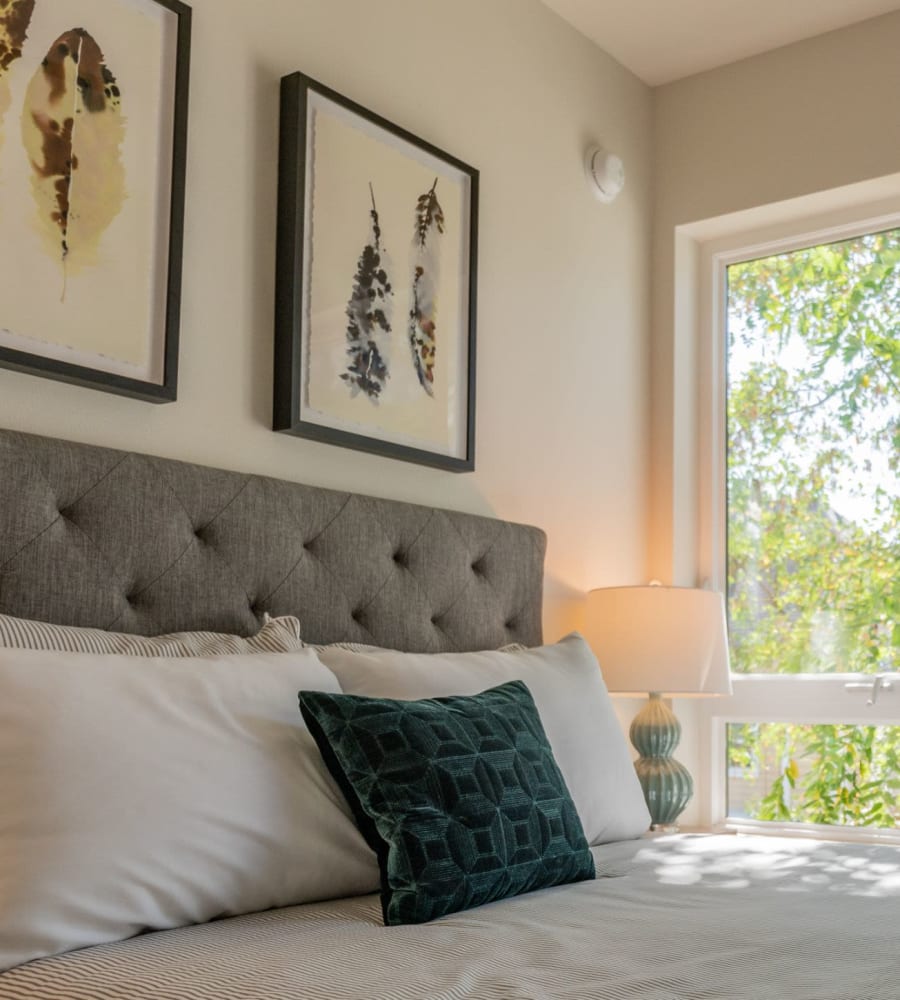 Bright bedroom with a view at Acqua Apartments in Portland, Oregon