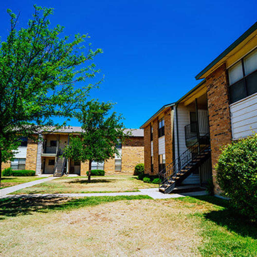 Side view of community apartment at Cross Timbers At Grand Street in Amarillo, Texas