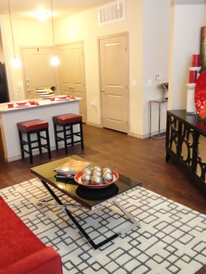 Model living room with open space concept at Anatole at City View in Lubbock, Texas