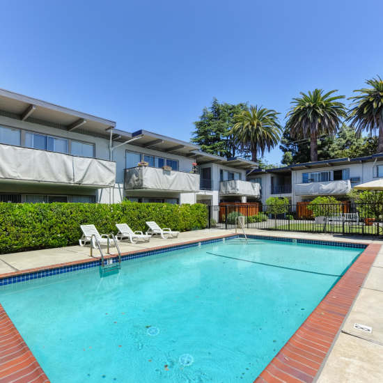 Swimming pool with shimmering water at Glenwood Garden Apartments in Mountain View, California