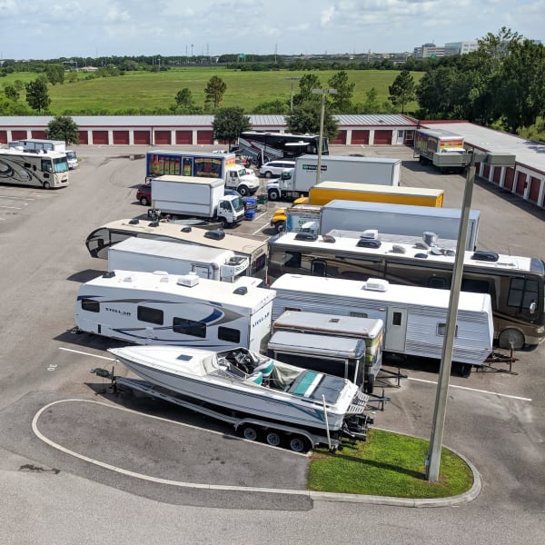 RVs, boats, and trucks parked at StorQuest Self Storage in Sarasota, Florida