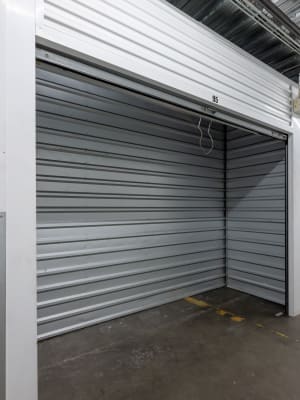 An open storage unit inside Nova Storage in South Gate, California