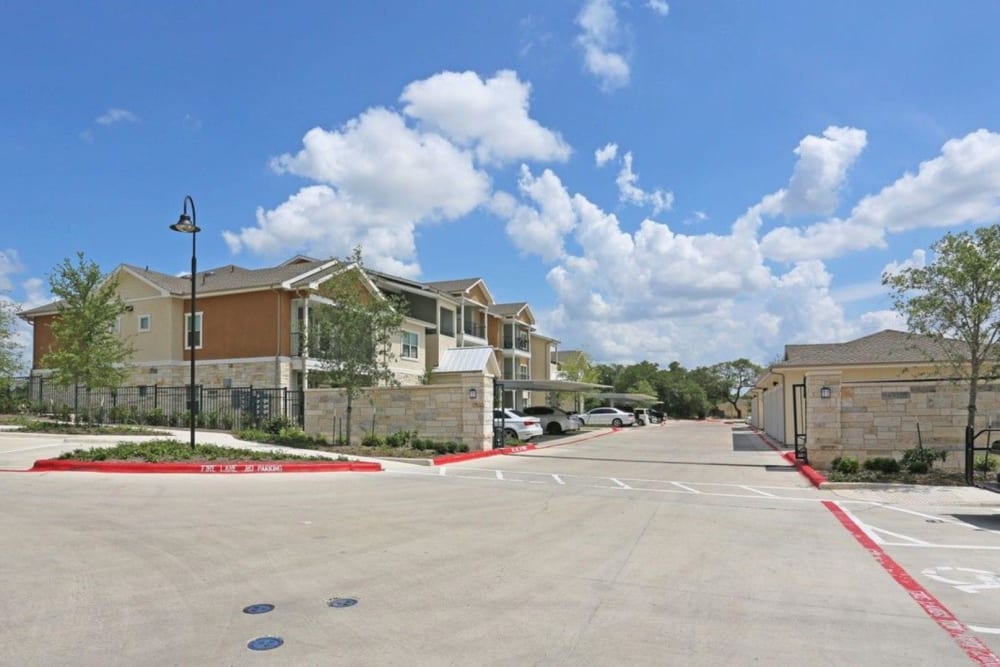 Entrance and driveway at Creekside at Kenney's Fort in Round Rock, Texas