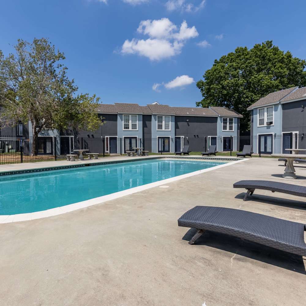 Pool at comminty Westchase Apartments in Harvey, Louisiana