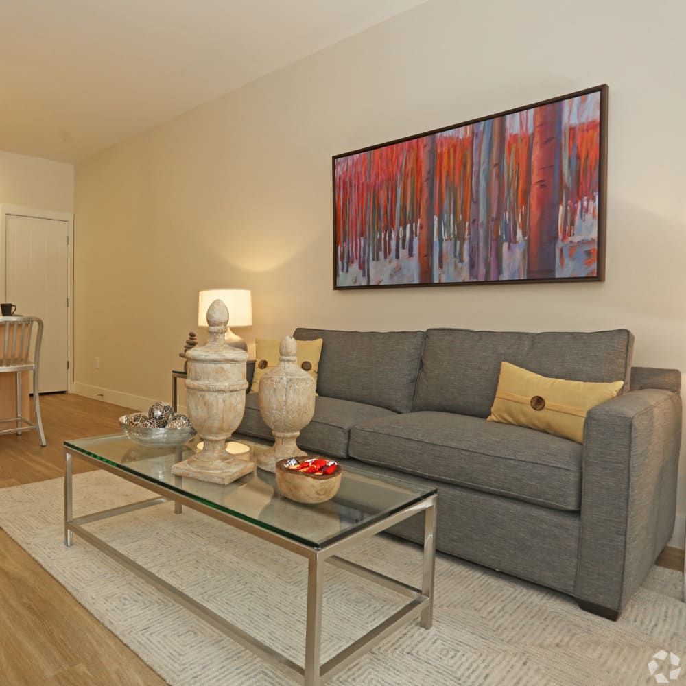 Resident living room with hardwood flooring at Mountain Trail in Flagstaff, Arizona