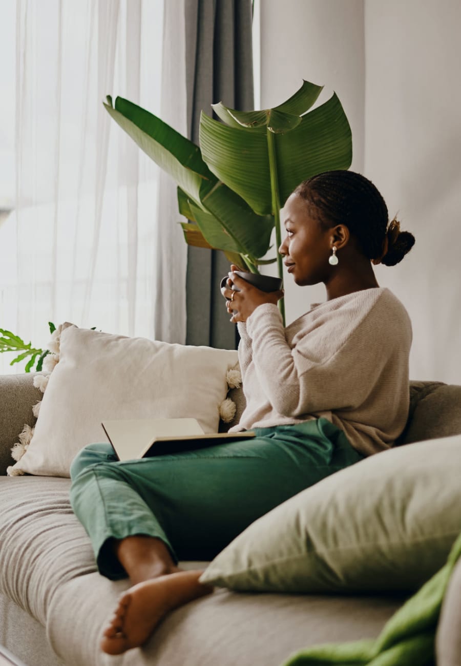 Resident relaxing at home at Lumen Briarcliff in Atlanta, Georgia