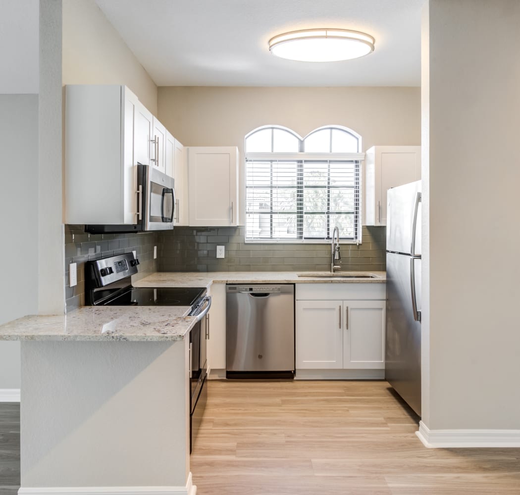 Gorgeous tiled kitchen at San Merano at Mirasol in Palm Beach Gardens, Florida