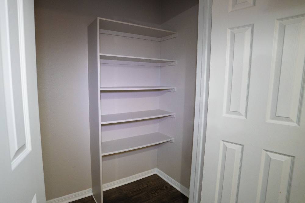Closet space of the townhome bedroom at Millpoint Townhomes in Henderson, Texas