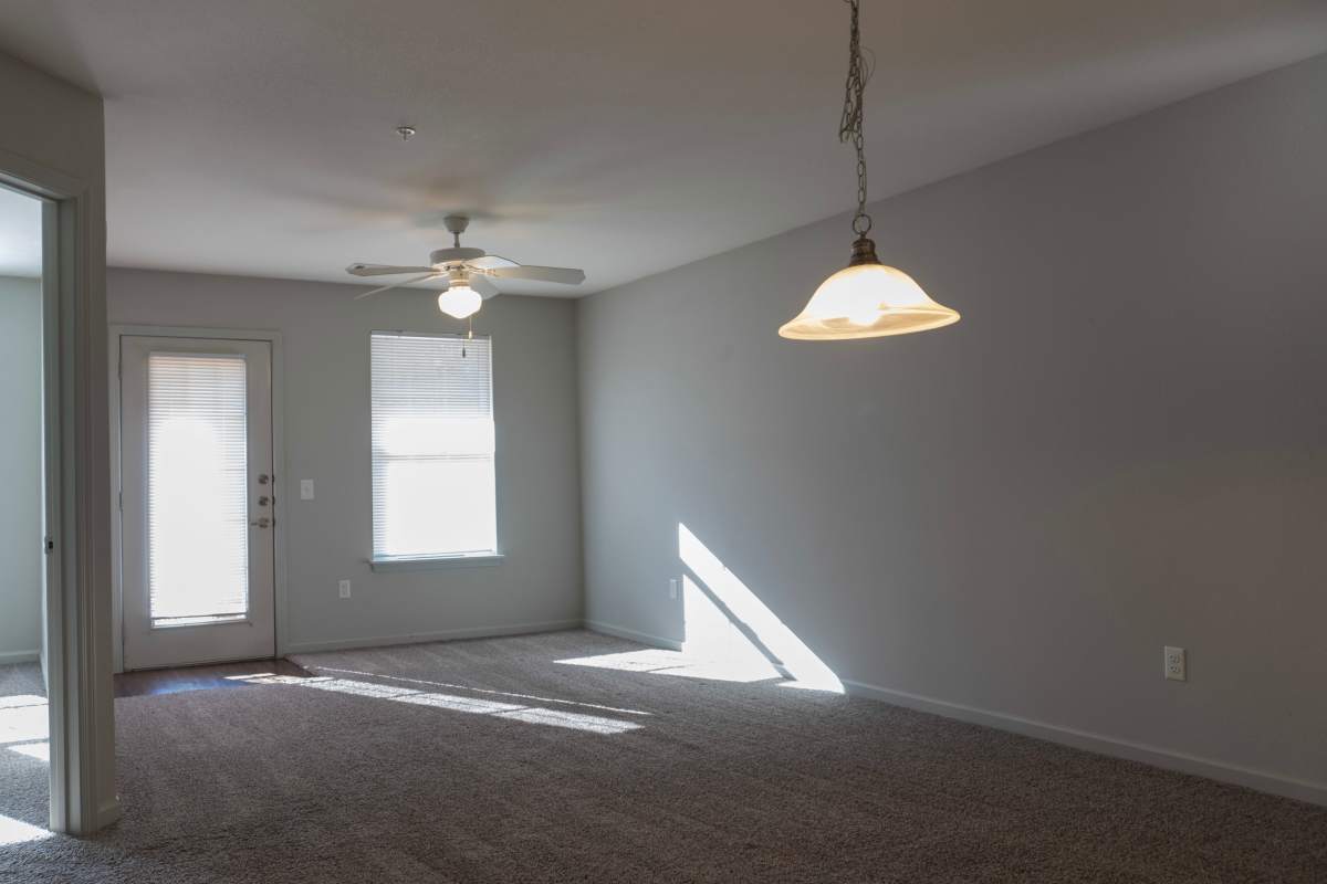 Well-lit and spacious apartment with ceiling fan at Redland Creek in Lawrenceville, Georgia