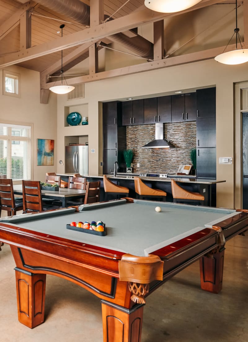 Game room with pool table at Marquis Cross Mountain in San Antonio, Texas