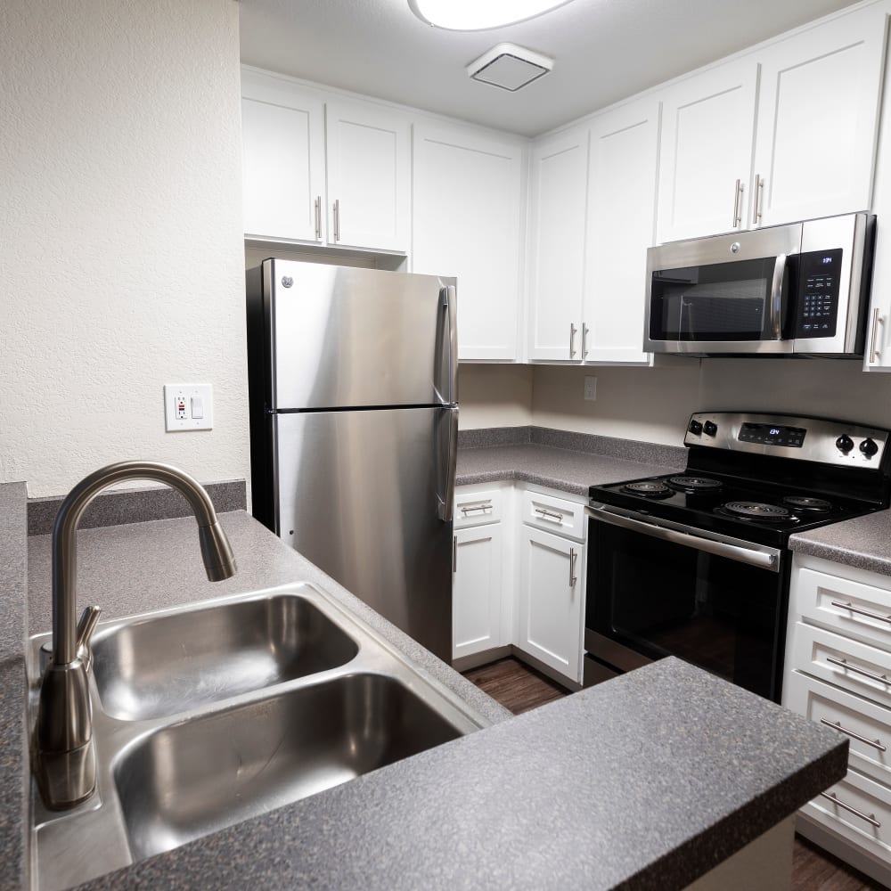 Open-concept living and kitchen at Haven Poway in Poway, California