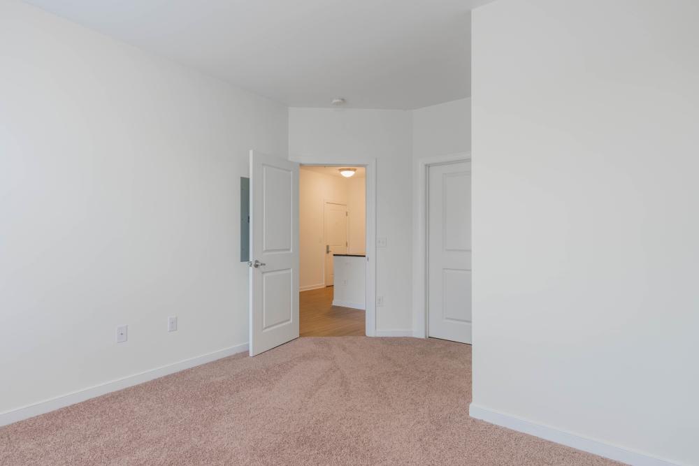 Bedroom with view of kitchen entrance at 2001 East in Richmond, Virginia