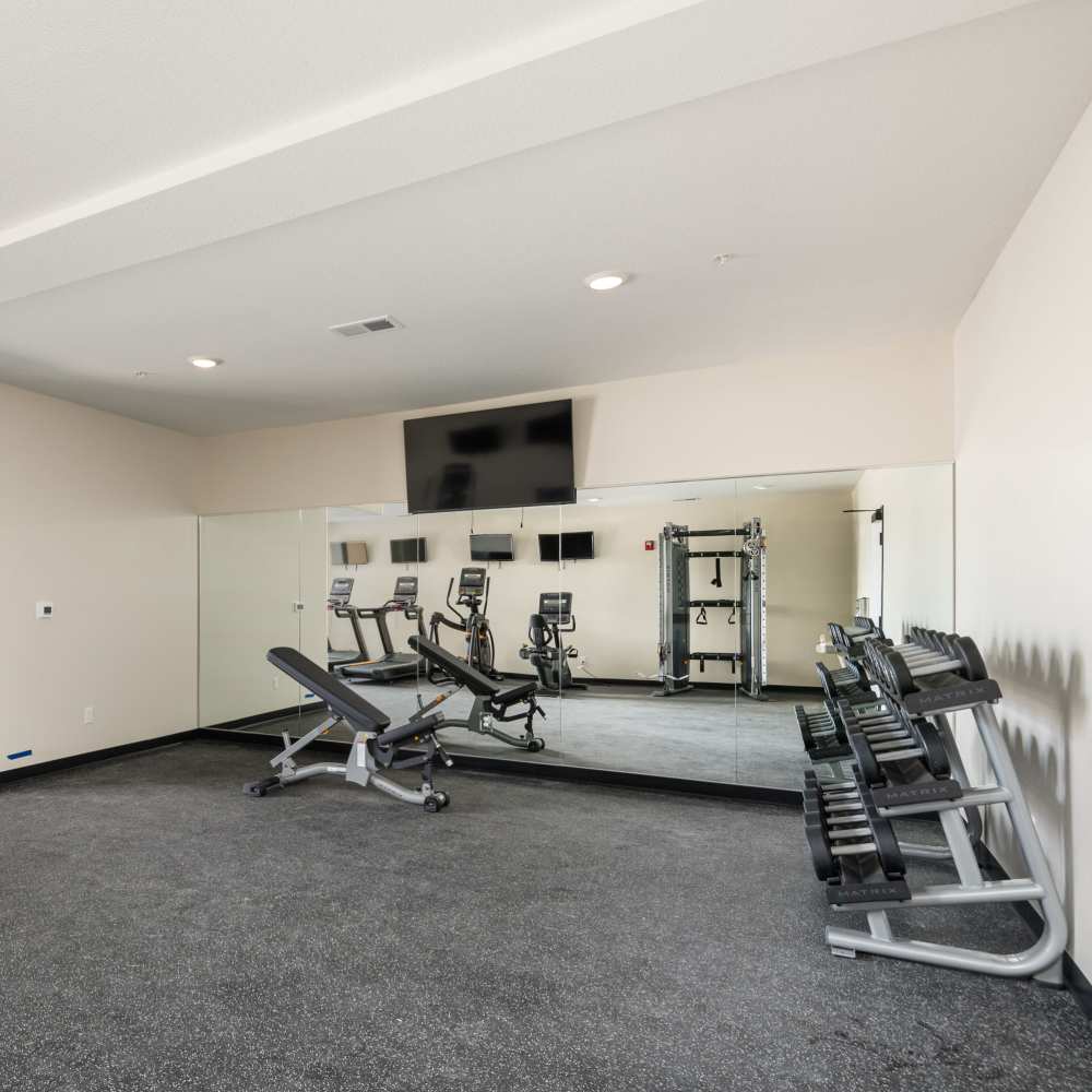Well-equipped fitness center at The Uptown Apartments in Waconia, Minnesota