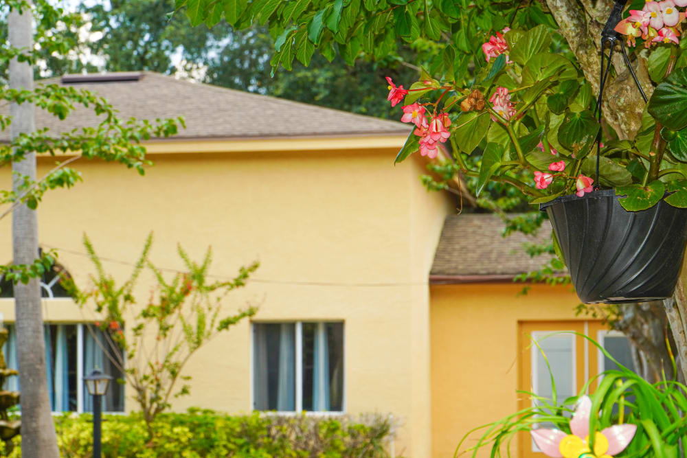 Lush landscaping and potted flowers at The Club at Bartow in Bartow, Florida