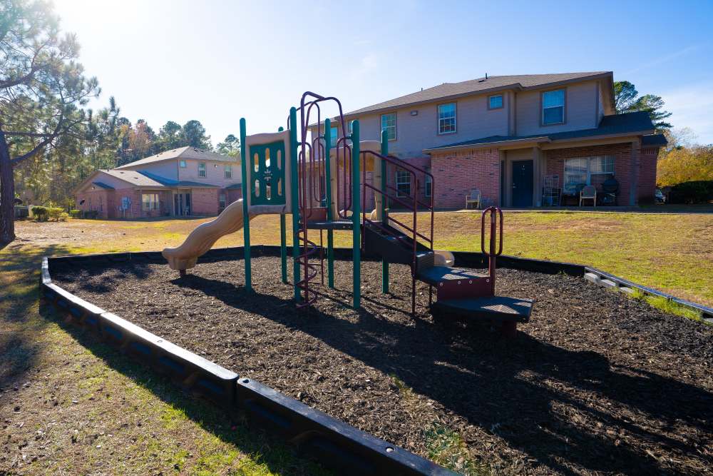 Playground at Millpoint Townhomes in Henderson, Texas