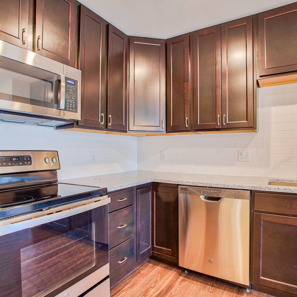 Kitchen with stainless-steel appliances at The Club at Dowling Village, North Smithfield, Rhode Island