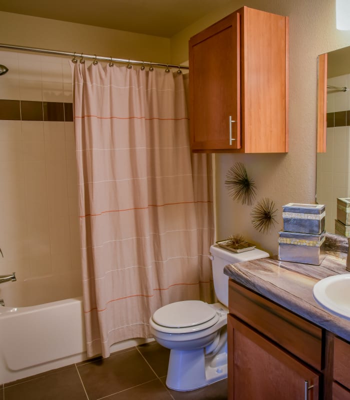 Bathroom with tile flooring at The Icon at Lubbock in Lubbock, Texas