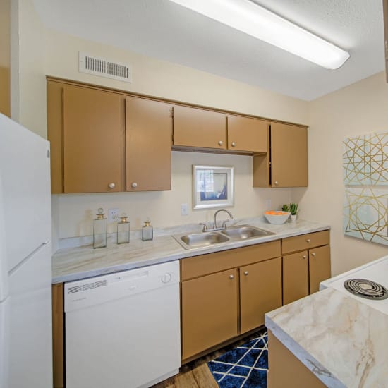 Apartment kitchen at Villas del Tesoro in Dallas, Texas