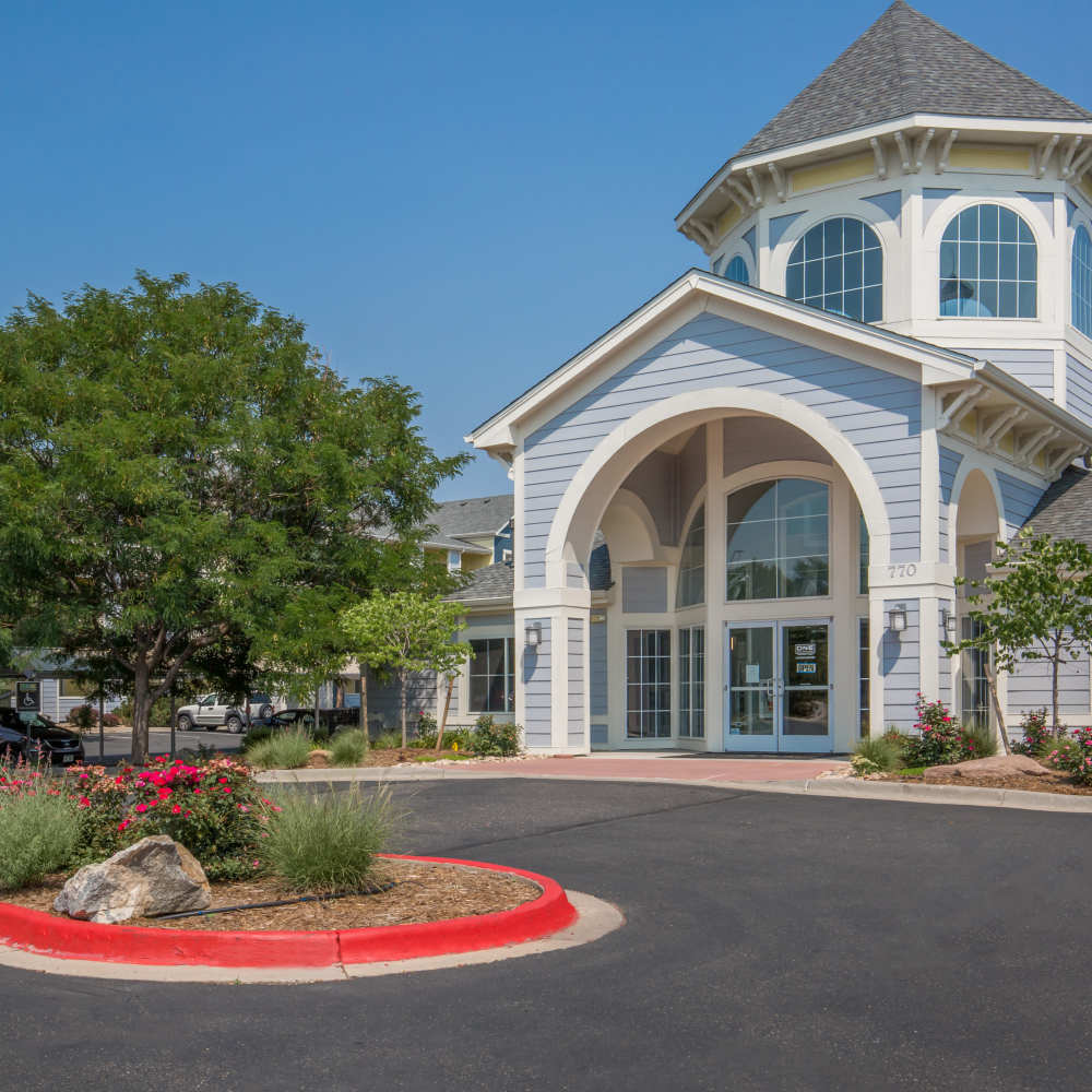 Front view of leasing office at One Belmar Place in Lakewood, Colorado
