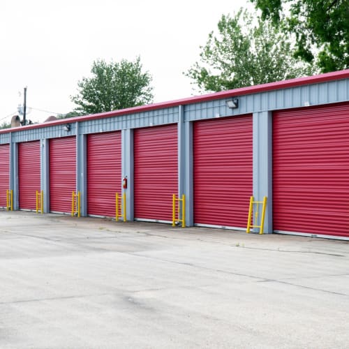 Storage units with red doors at Red Dot Storage in Hammond, Louisiana