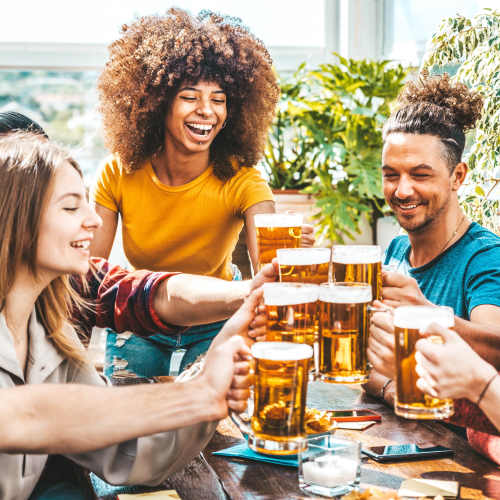 A group of friends having a beer at The Ellison in Las Vegas, Nevada