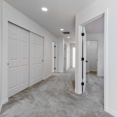 A hallway between rooms in an apartment at Meriwether Landing in Joint Base Lewis McChord, Washington