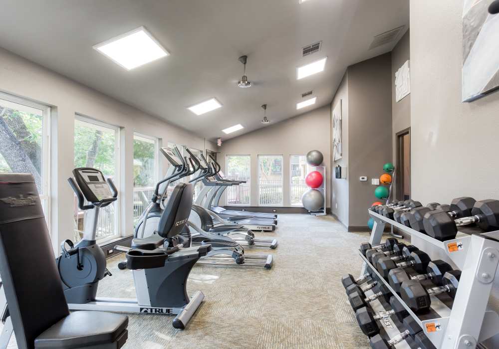 Well-equipped fitness center at Walnut Ridge in Arlington, Texas