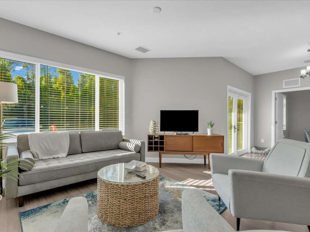 Luxury living room with modern furnishings at 81 West Apartments in Fort Myers, Florida 