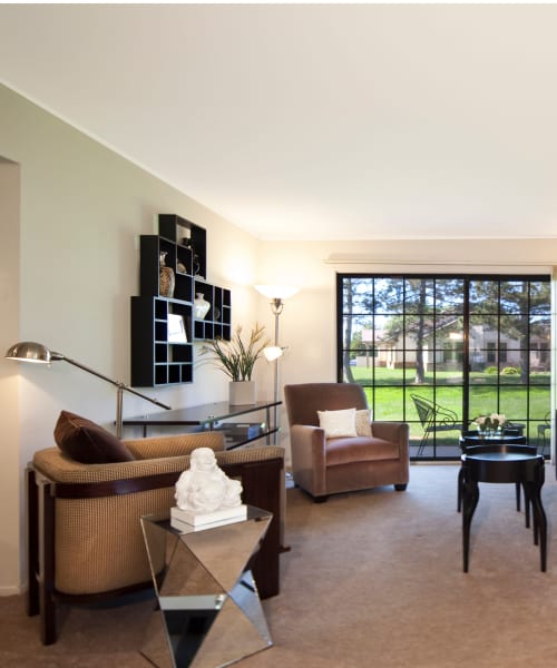 Living room with courtyard views at Muirwood in Farmington Hills, Michigan