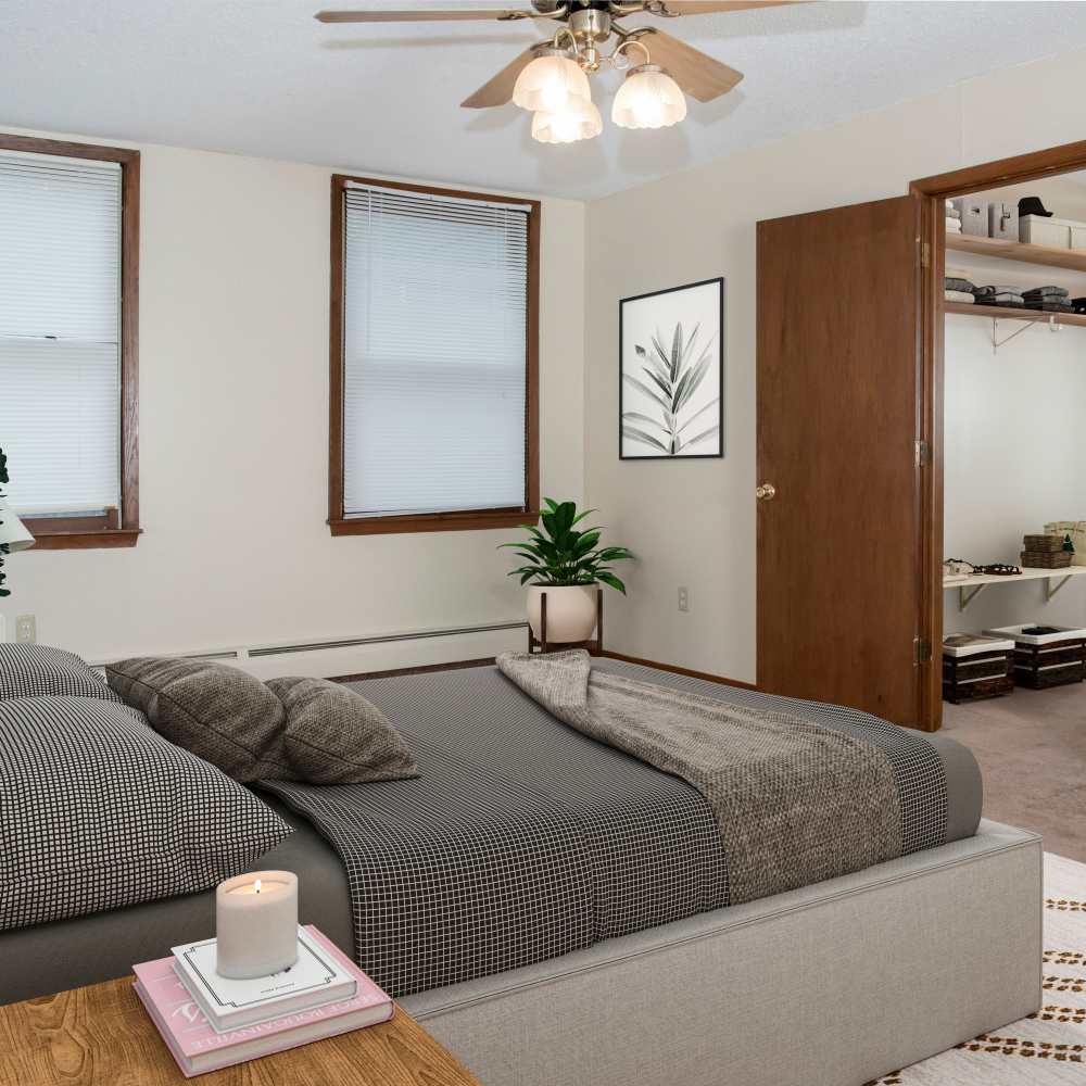 Luxury bedroom with closet  at Bass Lake Crossing in New Hope, Minnesota
