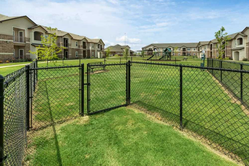 Fenced dog park at Pine Creek in Paris, Texas