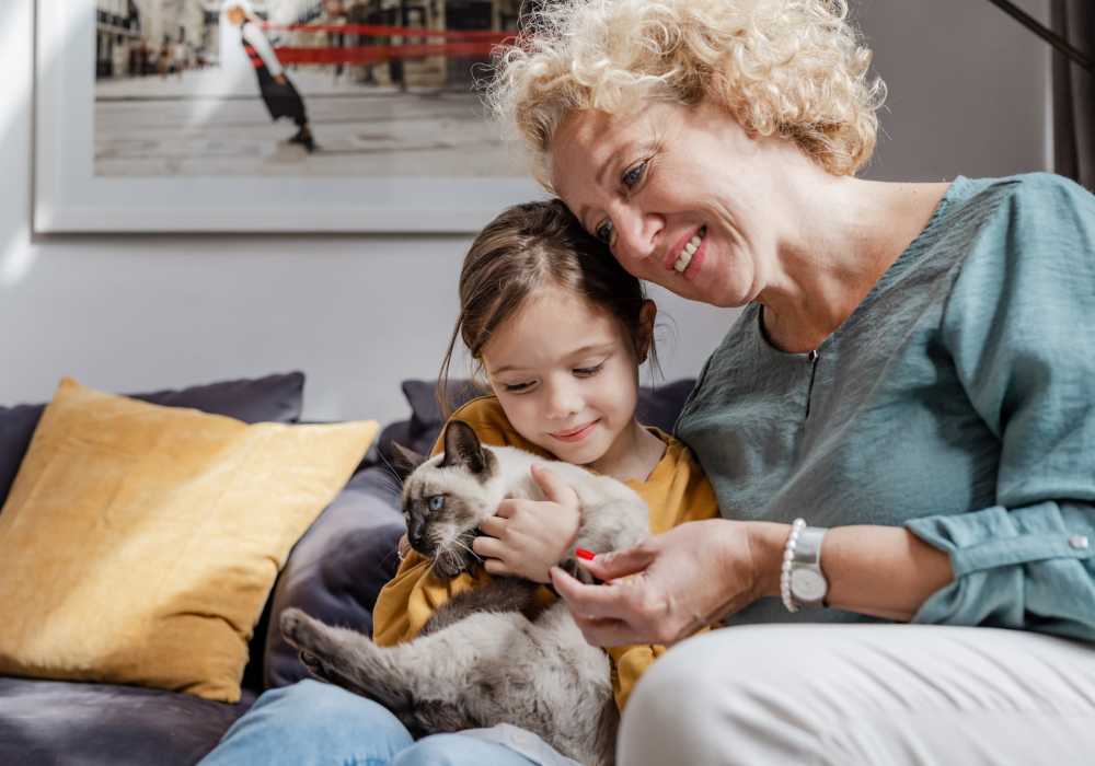Resident with her cat at Savannah House At Lawton in Lawton, Oklahoma