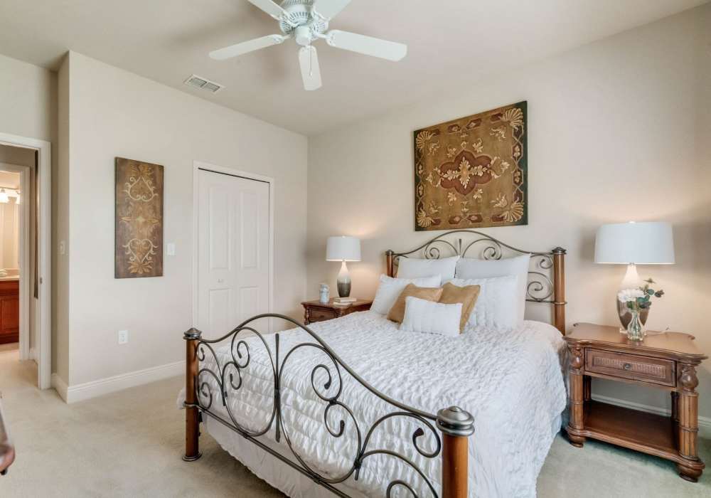 Model bedroom at Victoria Park Apartments in Davenport, Florida