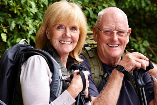 Couple hiking near Grassfields Commons in Dracut, Massachusetts