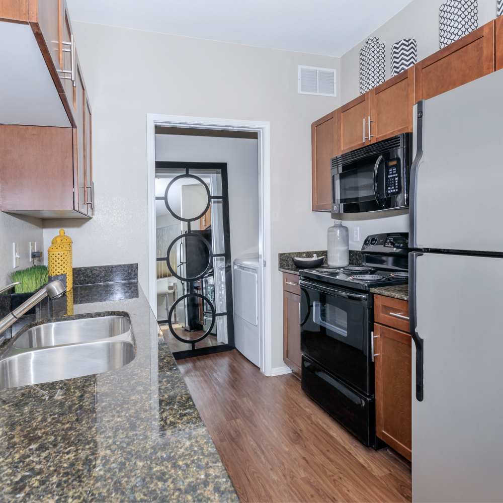 Kitchen with cabinetry at One Belmar Place in Lakewood,Colorado