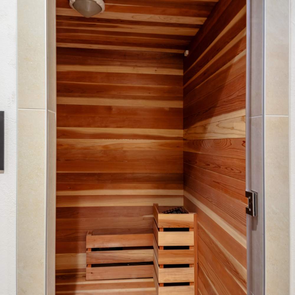  A wooden sauna room with a glass door at Night Fall in Las Vegas, Nevada