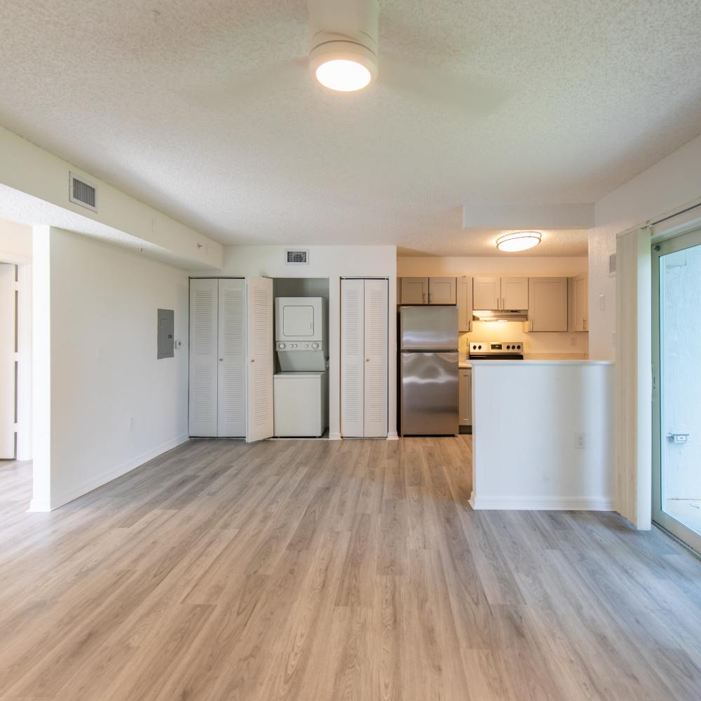 View of kitchen from the living room at Sunset Bay Apartments in Cutler Bay, Florida