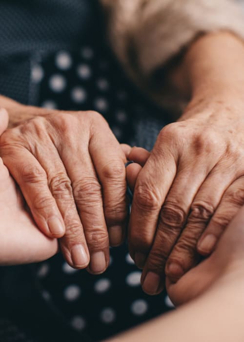 Comforting hands at The Pillars of Grand Rapids in Grand Rapids, Minnesota